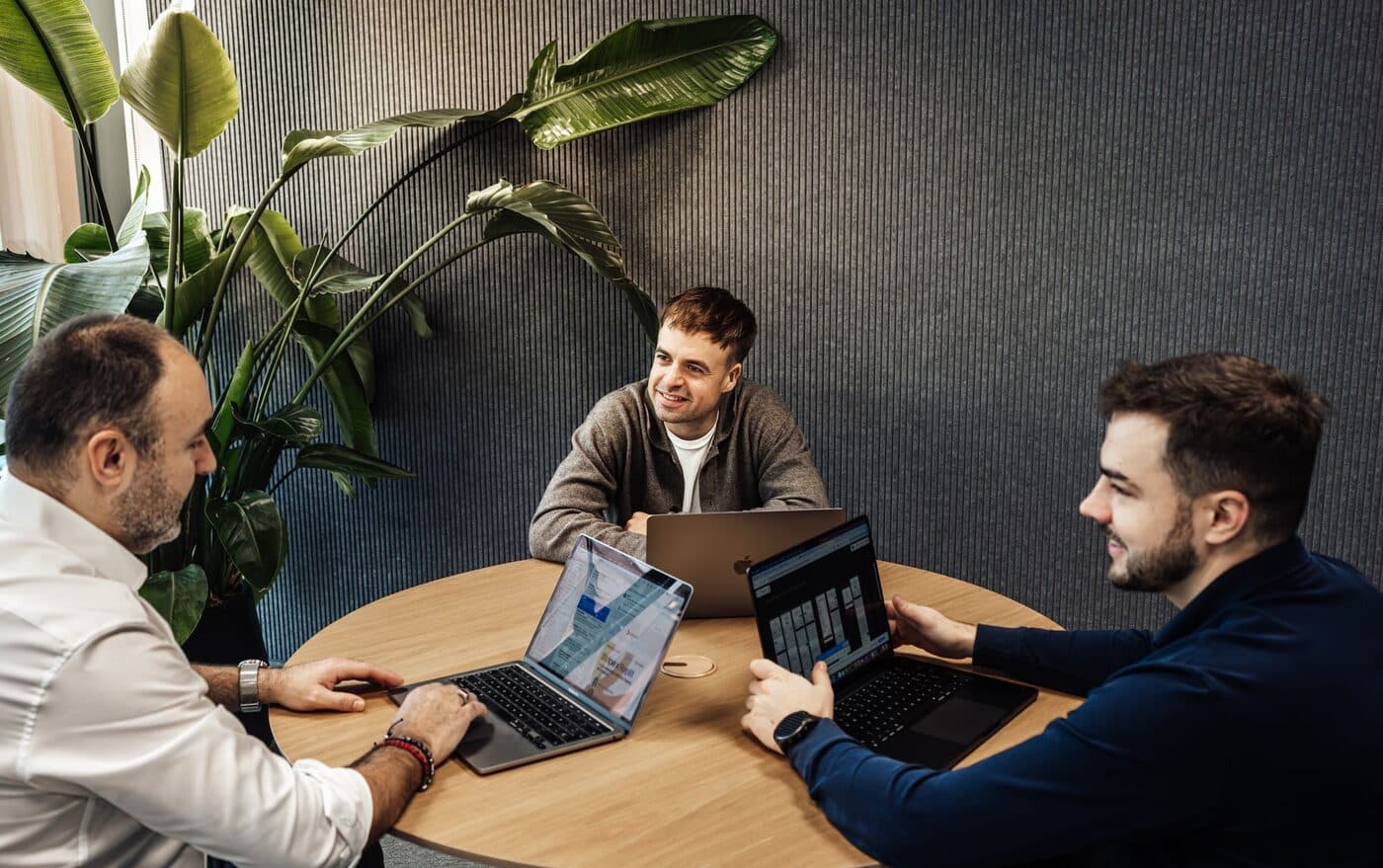 The Openora.ai team in a roundtable discussion